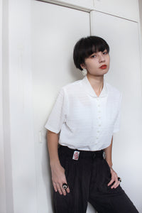 WHITE BLOUSE WITH PEARL BUTTONS