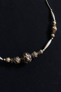 CARVED SILVER ROSES NECKLACE