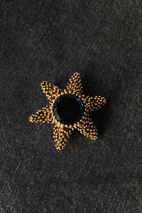 GOLD TONED STAR WITH BLUE RHINESTONE BROOCH