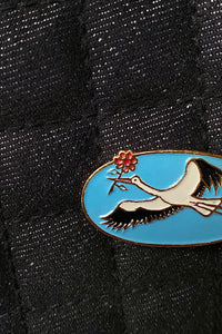 STORK WITH FLOWER PIN